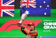 Oscar Piastri lifting the winner's trophy at the F1 Grand Prix Of China - Source: Getty